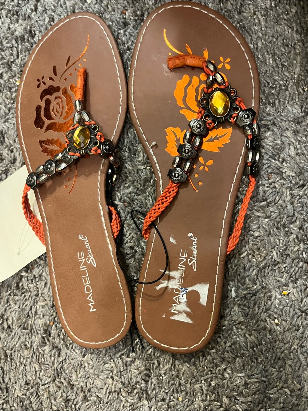 Madeline Stuart Brown Sandals with Orange Braided Straps and Yellow Gem Accents